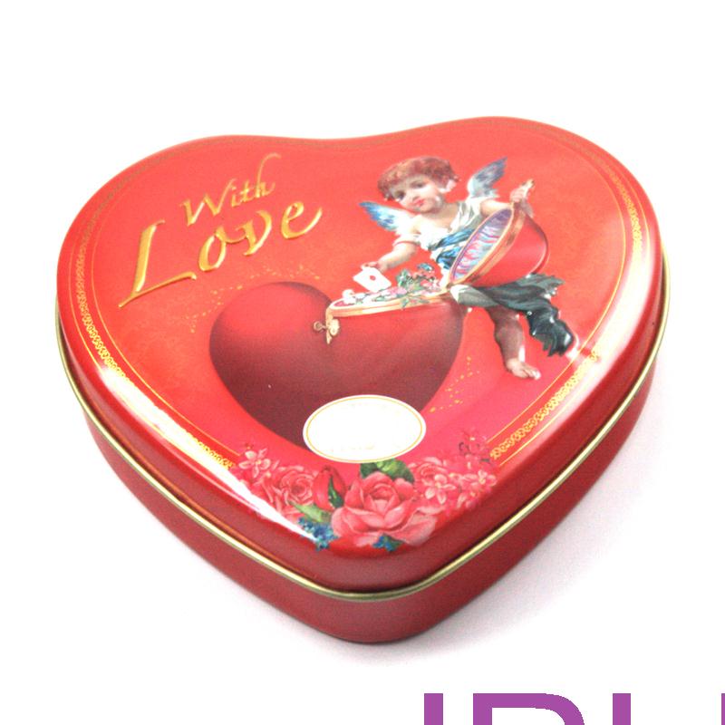 Small red heart shaped tin for chocolate